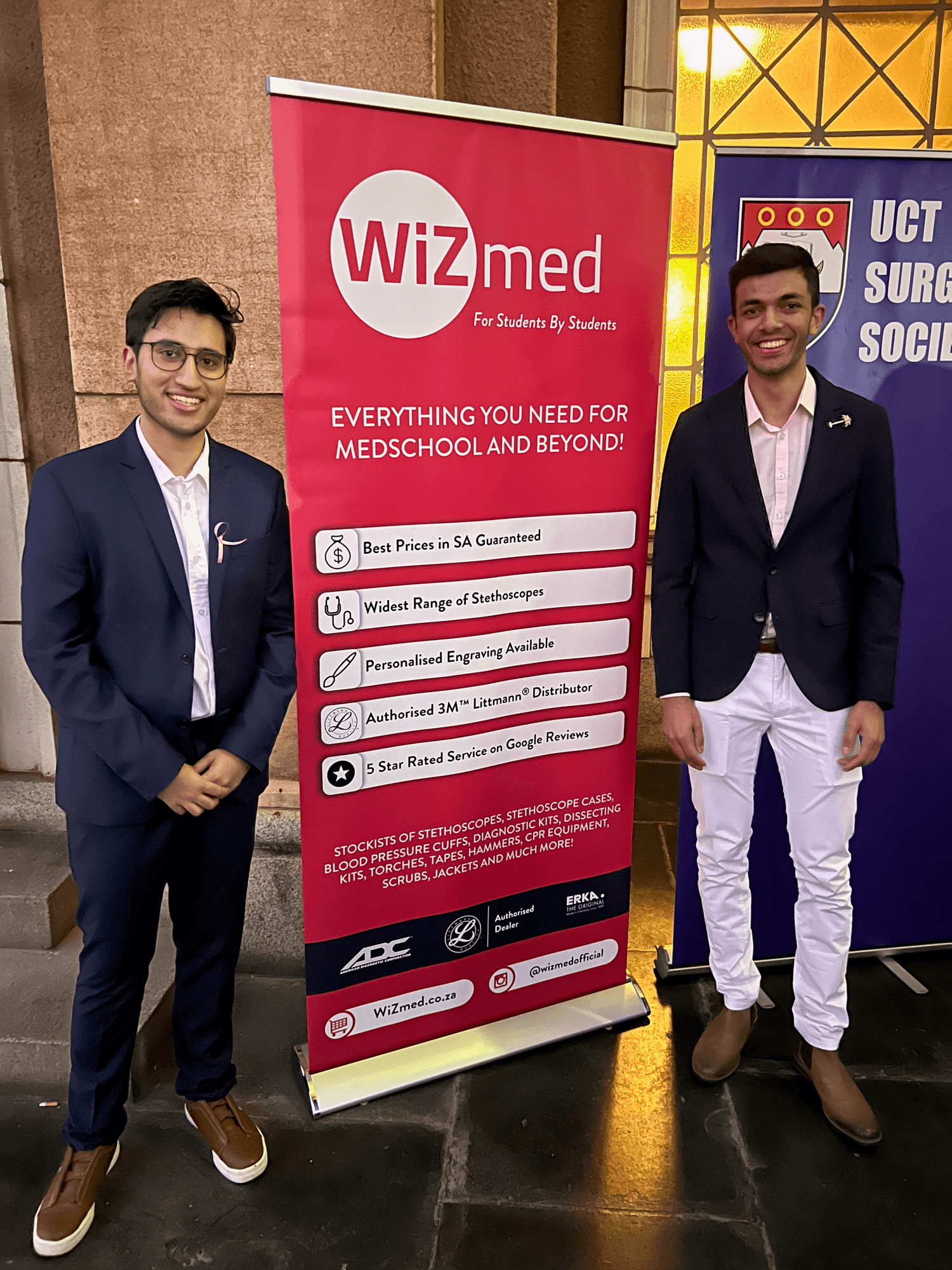 Waheed with WiZmed co-founder Ashraf beside the WiZmed banner